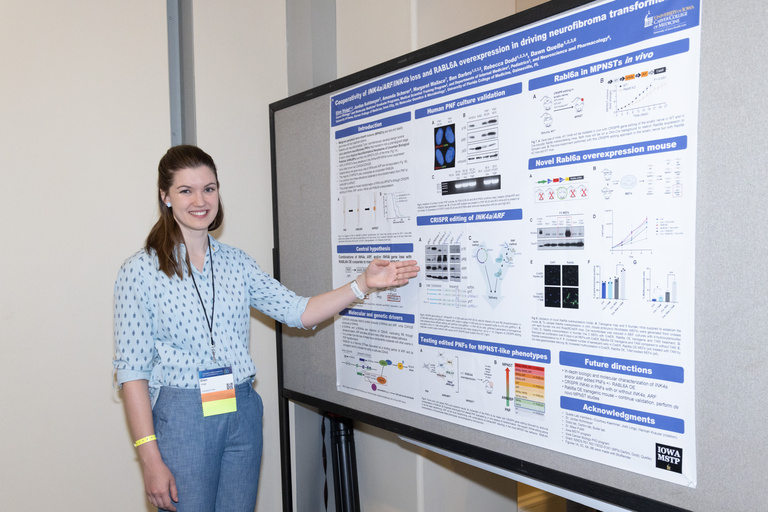 Ellen Voigt presenting a poster